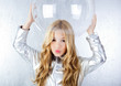Astronaut girl with silver uniform and glass helmet Astronaut girl with silver uniform and glass helmet