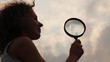 woman holds magnifier and slowly moves to it