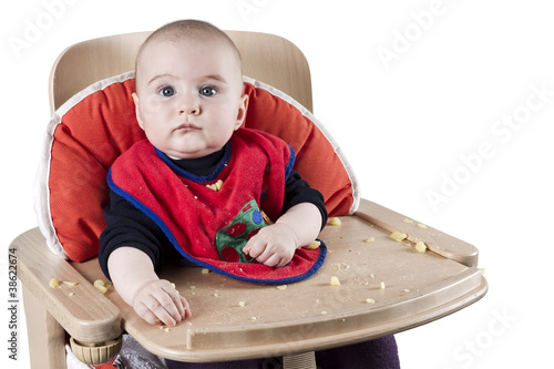 Foto: toddler eating potatoes toddler eating potatoes