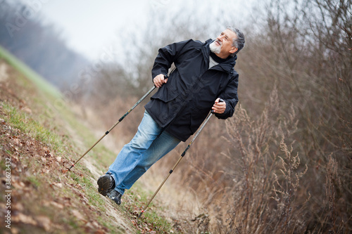 Photo: Senior man nordic walking Senior man nordic walking