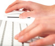 man typing with keyboard