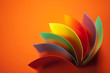Photo: detail of curved, colored sheets of paper detail of curved, colored sheets of paper