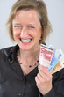 Photo: angry woman with money angry woman with money