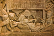Ancient Khmer carving of childbirth