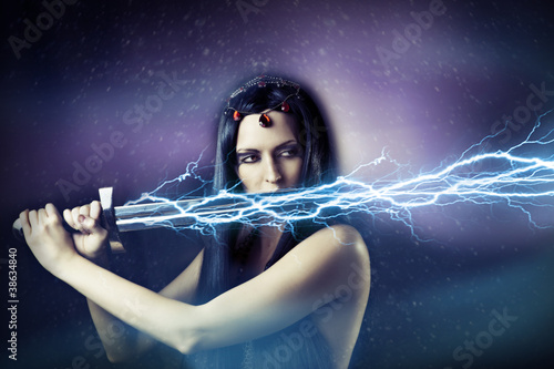 Photo: young sexy brunette woman. storm. young sexy brunette woman. storm.