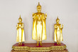 three golden buddha statues in wat pho, bangkok, thailand three golden buddha statues in wat pho, bangkok, thailand