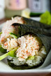 Foto: Fresh hand rolled crab sushi roll Fresh hand rolled crab sushi roll