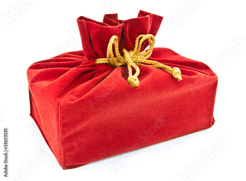 Photo: red fabric gift bag isolated red fabric gift bag isolated