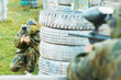 two paintball players