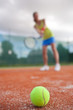 pretty, young female tennis player on the tennis court pretty, young female tennis player on the tennis court
