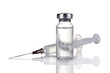 medical ampoules and syringe isolated on white