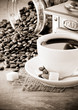 cup of coffee and grinder