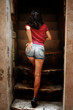 Sexy woman going up on stairs