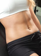 Close-up muscular woman abdomen