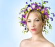 Beautiful woman with flower wreath