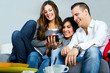 three friends having fun with a mobile phone