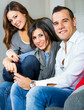 three friends having fun with a mobile phone
