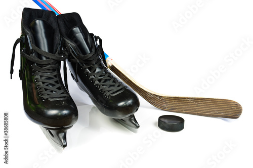 Photo: Hockey skates and stick Hockey skates and stick