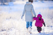 Mother and daughter on winter day
