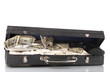 Cocaine and marijuana with gun in a suitcase isolated on white