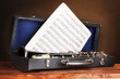 old clarinet and notebook with notes in case old clarinet and notebook with notes in case