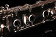 close up detail of clarinet on black background close up detail of clarinet on black background