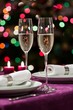 Foto: Christmas table setting with sparkling wine Christmas table setting with sparkling wine