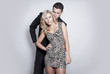 Portrait of romantic couple on gray background