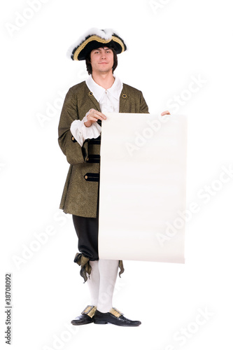 Photo: Man in a historical costume. Isolated Man in a historical costume. Isolated