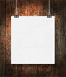 Blank on the paper clips. On dark grunge background.