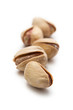Pile of pistachios on white