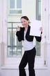 Success feeling, young woman with a blank certificate