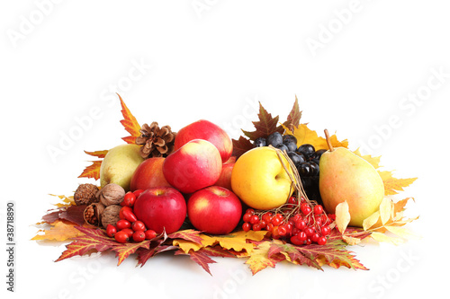 Photo: beautiful autumn harvest and leaves isolated on white beautiful autumn harvest and leaves isolated on white