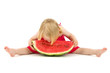 child eats melon
