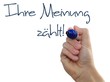 Stift an Wand schreiben - Meinungsumfrage