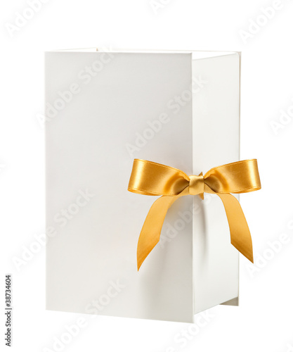 Photo: White box with golden bow White box with golden bow