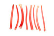 Rhubarb sticks or stalks on a white studio background. Rhubarb sticks or stalks on a white studio background.