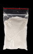Cocaine in package on black background