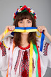 Foto: Cute Ukrainian woman with blue yellow band on the mouth Cute Ukrainian woman with blue yellow band on the mouth