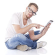 Good Looking Smart Nerd Man With Tablet Computer seeting on floo
