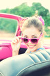 Photo: Vintage woman in retro car Vintage woman in retro car