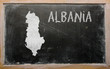 outline map of albania on blackboard