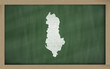 outline map of albania on blackboard