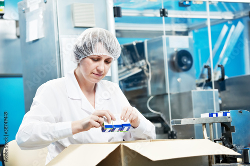 Photo: pharmaceutical factory worker pharmaceutical factory worker