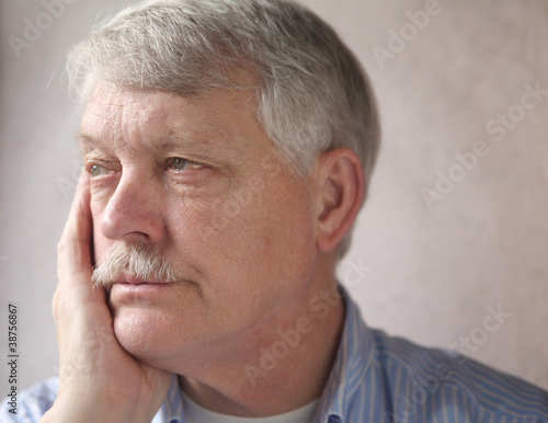 Photo: annoyed older man annoyed older man