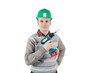 Young married man holds an electric drill in his hand