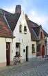 European small street with old brick houses European small street with old brick houses