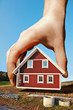putting up a small red house