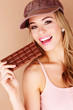 Beautiful Woman Biting In To Chocolate