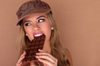Beautiful Woman Biting In To Chocolate